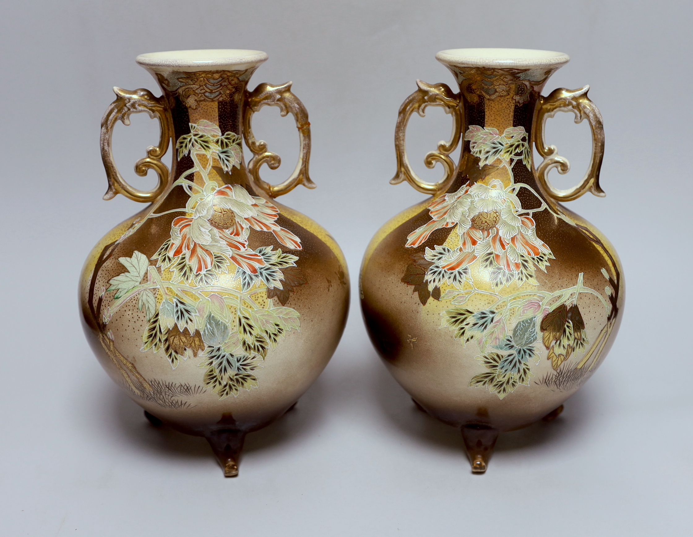 A pair of Japanese Satsuma pottery vases, 26cm